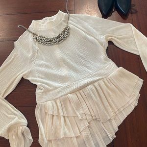 NWOT express  ivory peplum top . Never worn size small.